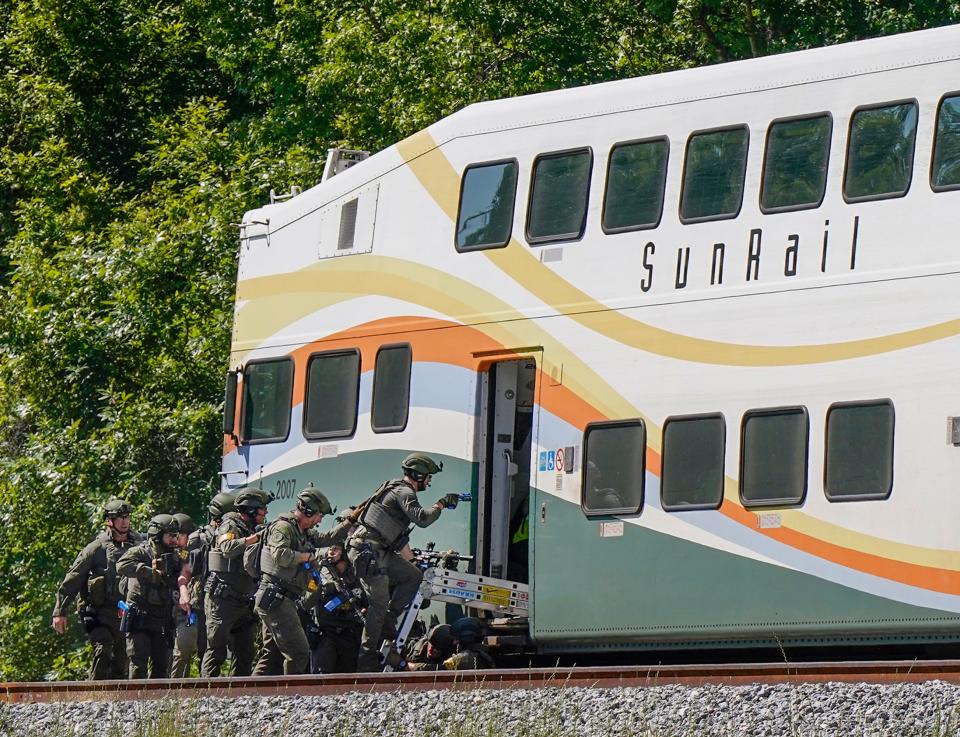 Volusia County Sheriff's Swat Team along with other agencies participate in a SunRail Disaster Training exercise at Lake Beresfrod Park in DeLand, Wednesday, May 1, 2024.