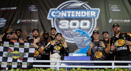 HOMESTEAD, FLORIDA - OCTOBER 22: Noah Gragson, driver of the #9 Bass Pro Shops/TrueTimber/BRCC Chevrolet, and crew celebrate in victory lane after winning the NASCAR Xfinity Series Contender Boats 300 at Homestead-Miami Speedway on October 22, 2022 in Homestead, Florida. (Photo by Sean Gardner/Getty Images) | Getty Images