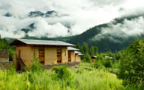 <p>Set deep in the Kingdom of <a rel="nofollow noopener" href="http://www.travelandleisure.com/travel-guide/bhutan" target="_blank" data-ylk="slk:Bhutan;elm:context_link;itc:0;sec:content-canvas" class="link ">Bhutan</a>—which, no offense to Disney, is known as the <a rel="nofollow noopener" href="http://www.travelandleisure.com/articles/photos-of-bhutan" target="_blank" data-ylk="slk:happiest place on earth;elm:context_link;itc:0;sec:content-canvas" class="link ">happiest place on earth</a>—lies the secluded <a rel="nofollow noopener" href="https://www.aman.com/resorts/amankora/" target="_blank" data-ylk="slk:Amankora;elm:context_link;itc:0;sec:content-canvas" class="link ">Amankora</a>, by Aman Resorts. The brand has a reputation for finding ultra-private locations for its lodgings, and Amankora, which sits in the shadows of the Himalayan Mountains, is no exception. Amankora is actually comprised of five remote lodges spread across the kingdom. For the most private digs, reserve either the eight-suite Punakha (which requires crossing a suspension bridge over the Mo Chhu River), or the equally intimate Gangtey, deep in the desolate Phobjikha Valley and surrounded by a wildlife preserve. Each lodge is a serene oasis and the perfect place to disconnect. </p>