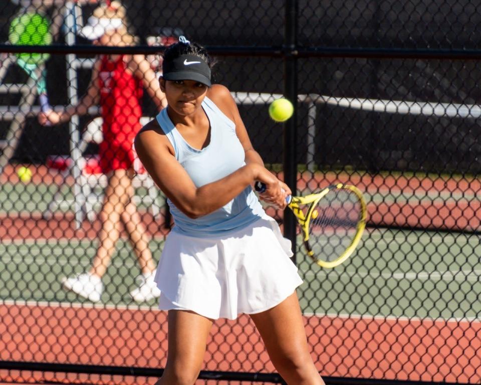South Bend Saint Joseph's Anni Amalnathan makes a return in the state team semifinals against Carmel June 4. Amalnathan and her sister, Ashi, won the Indiana state doubles championship Saturday in Indianapolis.