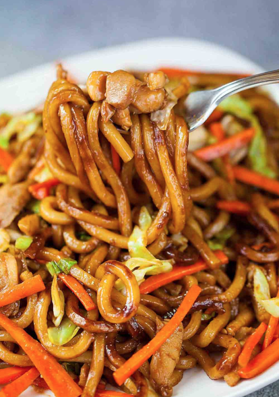 <p>Oh My Food Recipes</p><p>Tasty and simple chicken udon stir fry only takes 15 minutes! It's great for lunch, dinner or as party food.</p><p><strong>Get the recipe: <a href="https://www.ohmyfoodrecipes.com/chicken-stir-fried-udon-noodles/" rel="nofollow noopener" target="_blank" data-ylk="slk:Chicken Udon Stir Fry;elm:context_link;itc:0;sec:content-canvas" class="link ">Chicken Udon Stir Fry</a></strong></p>