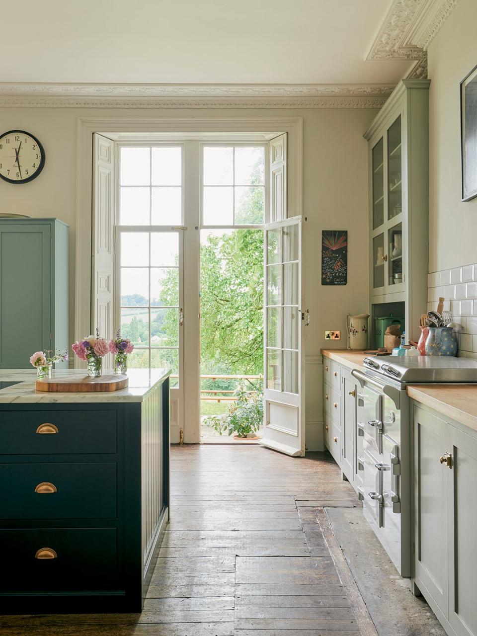 large kitchen with door leading outside