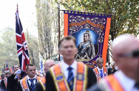 Members of the Orange Order march with a banner showing Queen Victoria during a pro-Union rally in Edinburgh, Scotland September 13, 2014. REUTERS/Dylan Martinez