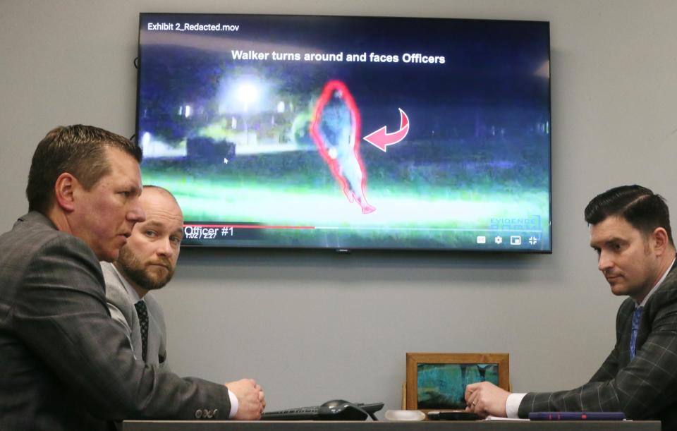 Attorneys Don Malarcik, from left, Noah Munyer and Jacob Will, who represent three of the eight officers involved in Jayland Walker's shooting, discuss videos they had made that show what happened before the shooting from the perspective of the police officers.
