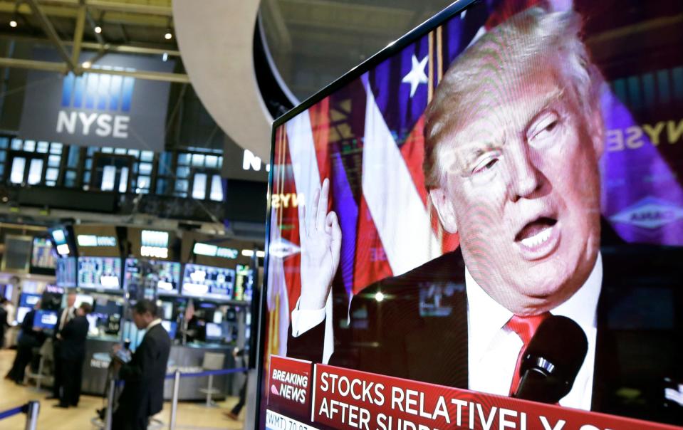 Donald Trump on a television screen at the New York Stock Exchange.