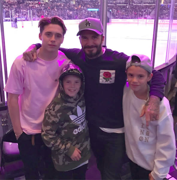 David Beckham spends some time with his sons Brooklyn, Romeo and Cruz  rink-side at the LA Kings game