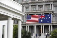 An American and Australian flag hang from the Eisenhower Executive Office Building on the grounds of the White House Complex in Washington, Tuesday, Sept. 17, 2019, ahead of Australian Prime Minister Scott Morrison's state visit. President Donald Trump is scheduled to welcome Morrison to the White House Friday, Sept. 20. (AP Photo/Patrick Semansky)