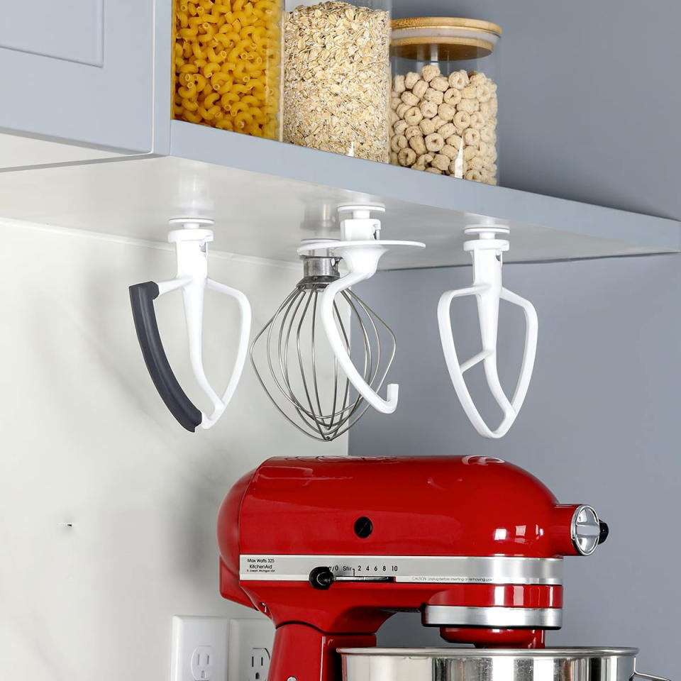 kitchen aid attachment storage in cabinet