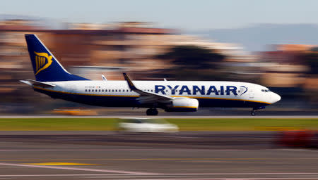 FILE PHOTO: A Ryanair aircraft lands at Ciampino Airport in Rome, Italy December 24, 2016. REUTERS/Tony Gentile