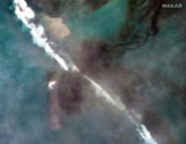 In this satellite image provided by 2020 Maxar Technologies on Friday, Aug. 7, 2020, an aerial view of oil leaking from the MV Wakashio, a bulk carrier ship that recently ran aground off the southeast coast of Mauritius. The prime minister of Mauritius says the government is appealing to France for help with a brewing environmental disaster after a ship that ran aground almost two weeks ago off the Indian Ocean island nation began leaking oil. Prime Minister Pravind Jugnauth said Friday that the leak “represents a danger for Mauritius" and that his country doesn’t have the skills and expertise to refloat stranded ships. ( 2020 Maxar Technologies via AP)