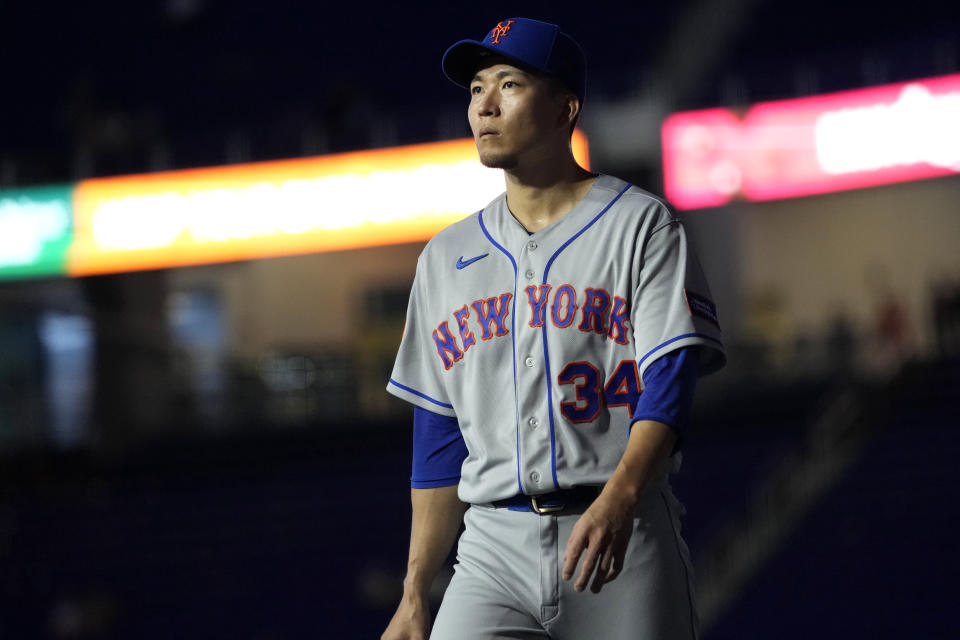 New York Mets starting pitcher Kodai Senga, of Japan, walks to the dugout before a baseball game against the Miami Marlins, Wednesday, Sept. 20, 2023, in Miami. (AP Photo/Lynne Sladky)