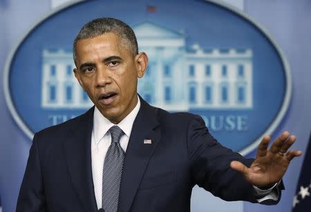 U.S. President Barack Obama speaks about the situation in Ukraine from the White House in Washington, July 18, 2014. REUTERS/Larry Downing