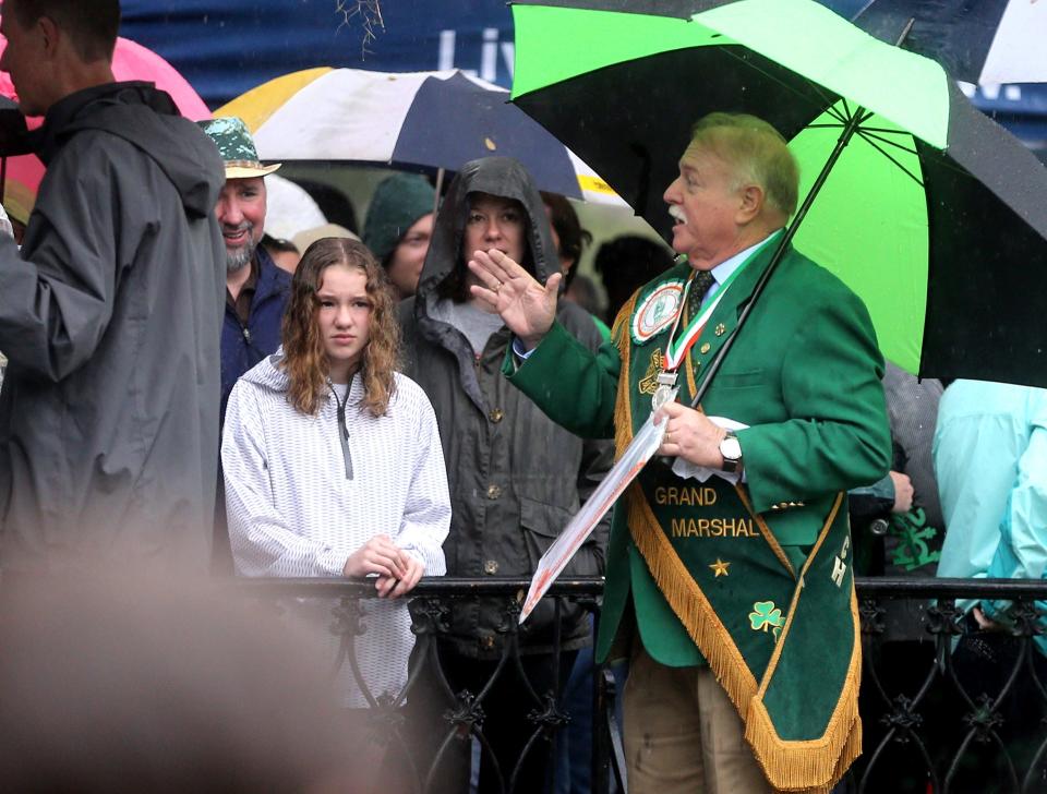 St. Patrick's Day Parade Grand Marshal George Schwarz talks to spectators during the annual Greening of the Fountain on Friday March 10, 2023 at Forsyth Park.