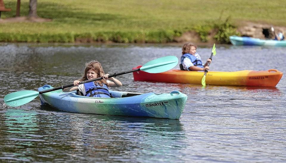 Kids learn new skills at summer camp.