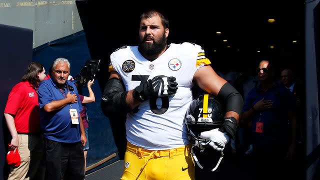 Villanueva stands alone during the anthem. Pic: Getty