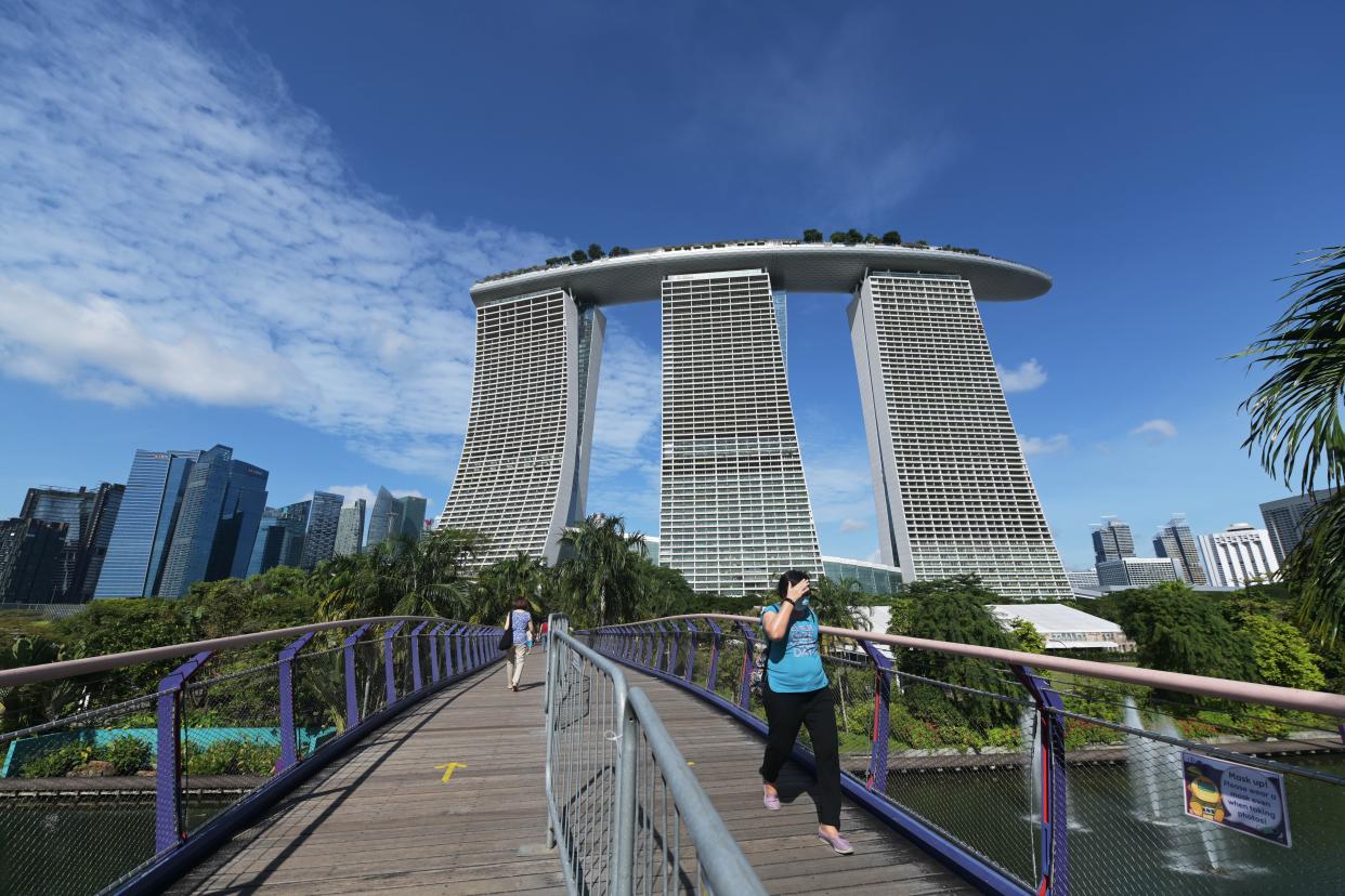 SINGAPORE, Dec. 14, 2020 -- A woman visits the Gardens by the Bay in Singapore, Dec. 14, 2020. Singapore's Prime Minister Lee Hsien Loong said on Monday that Singapore will enter Phase 3 of re-opening on Dec. 28. (Photo by Then Chih Wey/Xinhua via Getty) (Xinhua/Then Chih Wey via Getty Images)