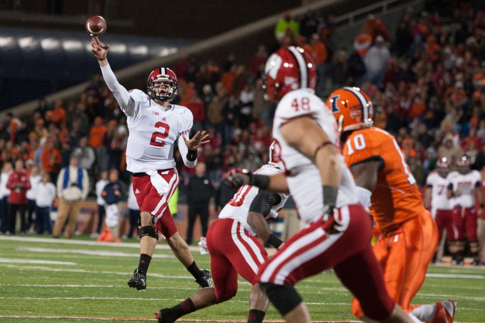 Oct. 19, 2013; Champaign, Illinois; Wisconsin Badgers quarterback Joel Stave (2) passes the ball in the third quarter of the game against the Illinois Fighting Illini at Memorial Stadium. Wisconsin won, 56-32, over Illinois. Trevor Ruszkowksi-USA TODAY Sports