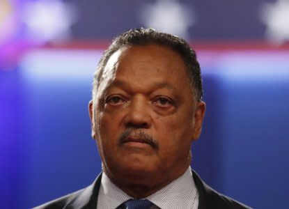 FILE PHOTO: Jesse Jackson arrives to attend the  third and final 2016 presidential campaign debate between Donald Trump and Hillary Clinton at UNLV in Las Vegas, Nevada, U.S., October 19, 2016. REUTERS/Mike Blake