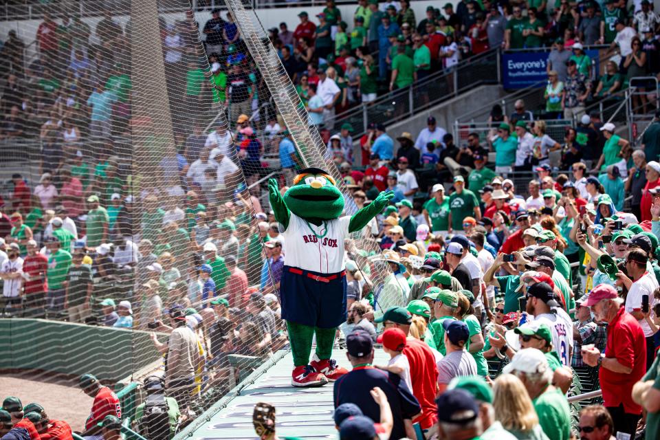 Wally the mascot for the  Boston Red Sox performs during a spring training game between the Boston Red Sox and the Atlanta Braves at Jet Blue Park in Fort Myers on Friday, March 17, 2023.  