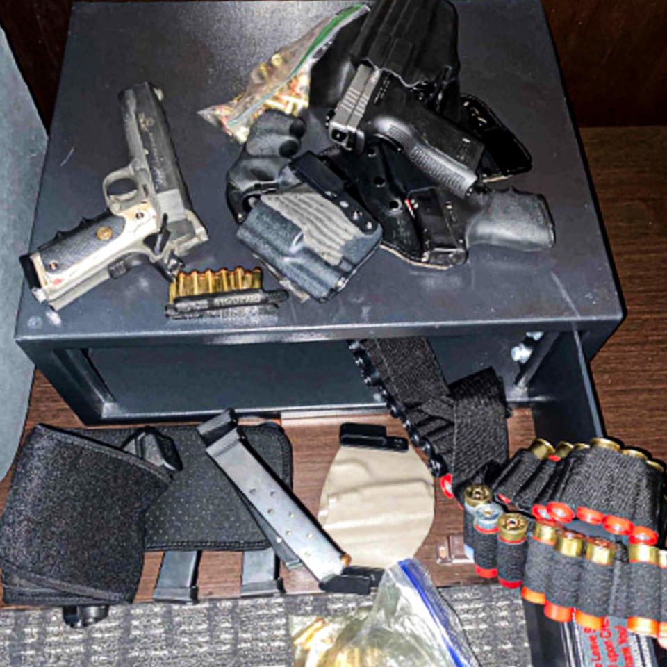 Mele took photographs of the handguns, holsters, ammunition, and magazines they brought into their hotel room. (U.S. District Court for the District of Columbia)