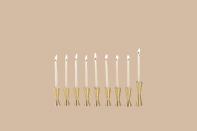 <p>Count the days of Hanukkah in style with this set of nine individual candle holders—each one is scored to signify the passing nights and feature a reclaimed leather base for traction and tapered top to collect dripping wax. Due to their modular shapes, they can be configured to fit almost any tabletop space. Over the years, the brass will take on a beautiful patina.</p><p><em>Avandi Counting Menorah, $425, </em><a href="http://www.avandistudio.com/shop/counting-menorah" rel="nofollow noopener" target="_blank" data-ylk="slk:avandistudio.com;elm:context_link;itc:0;sec:content-canvas" class="link "><em>avandistudio.com</em></a><em>.</em></p>