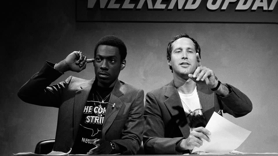 Eddie Murphy and Chevy Chase during the "Weekend Update" segment of an April 1981 episode of "Saturday Night Live." - Fred Hermansky/NBCU Photo Bank/Getty Images