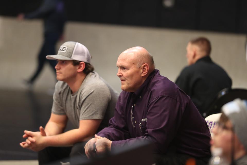 Bill Swertfager (right) coaches alongside his son, John Swertfager (left) during the divisional wrestling tournament at John Jay-Cross River on Feb. 8, 2020.