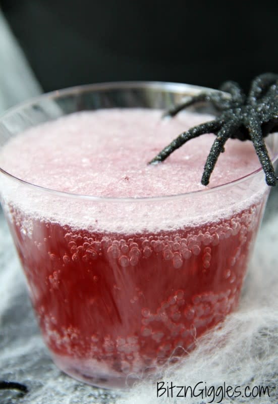 <p>Bitz & Giggles</p><p>A magical punch that fizzes and bubbles when you add the secret ingredient. Tastes delicious, too! Great for mad scientist and Halloween parties or just anytime you need a little magic.</p><p><strong>Get the recipe: <a href="https://bitzngiggles.com/magic-potion-punch/" rel="nofollow noopener" target="_blank" data-ylk="slk:Magic Potion Punch;elm:context_link;itc:0;sec:content-canvas" class="link "><em>Magic Potion Punch</em></a></strong></p>