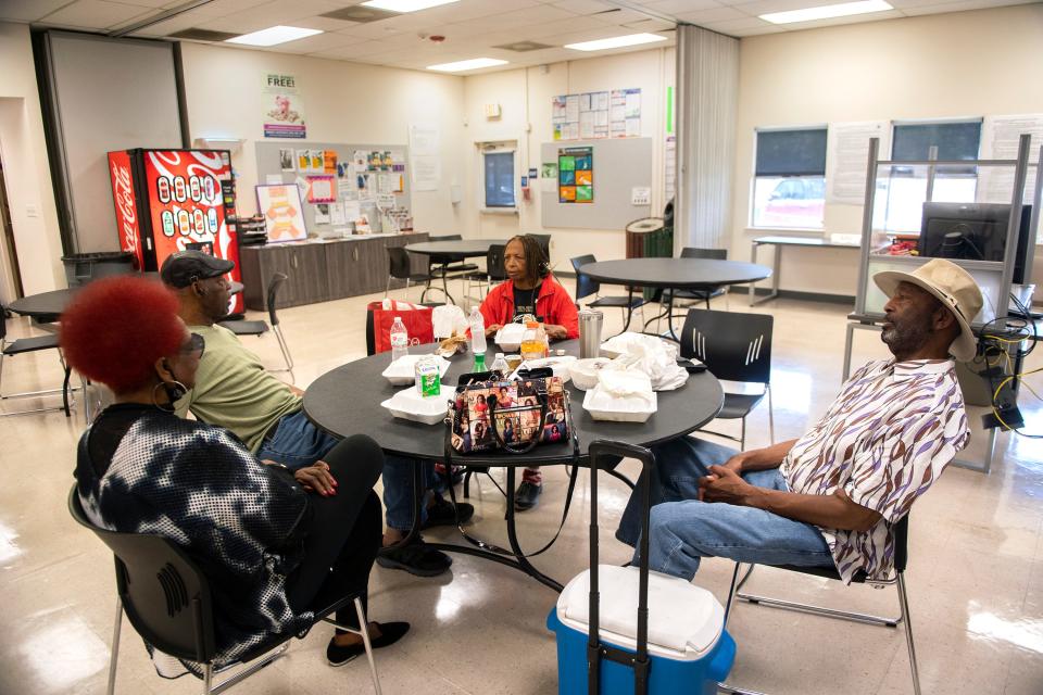 Fay Villa, left, Al Clark, Gloria Lassiter and Donnie Hale, Sr. seek refuge from triple-digit temperatures at the cooling zone at the Taft Community Center in south Stockton on Tuesday, August, 16, 2022.  CLIFFORD OTO/THE STOCKTON RECORD