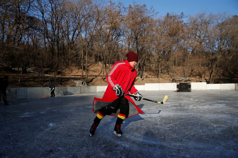 The Wider Image: On a frozen pond far from the Olympics, meet China's ice hockey veterans