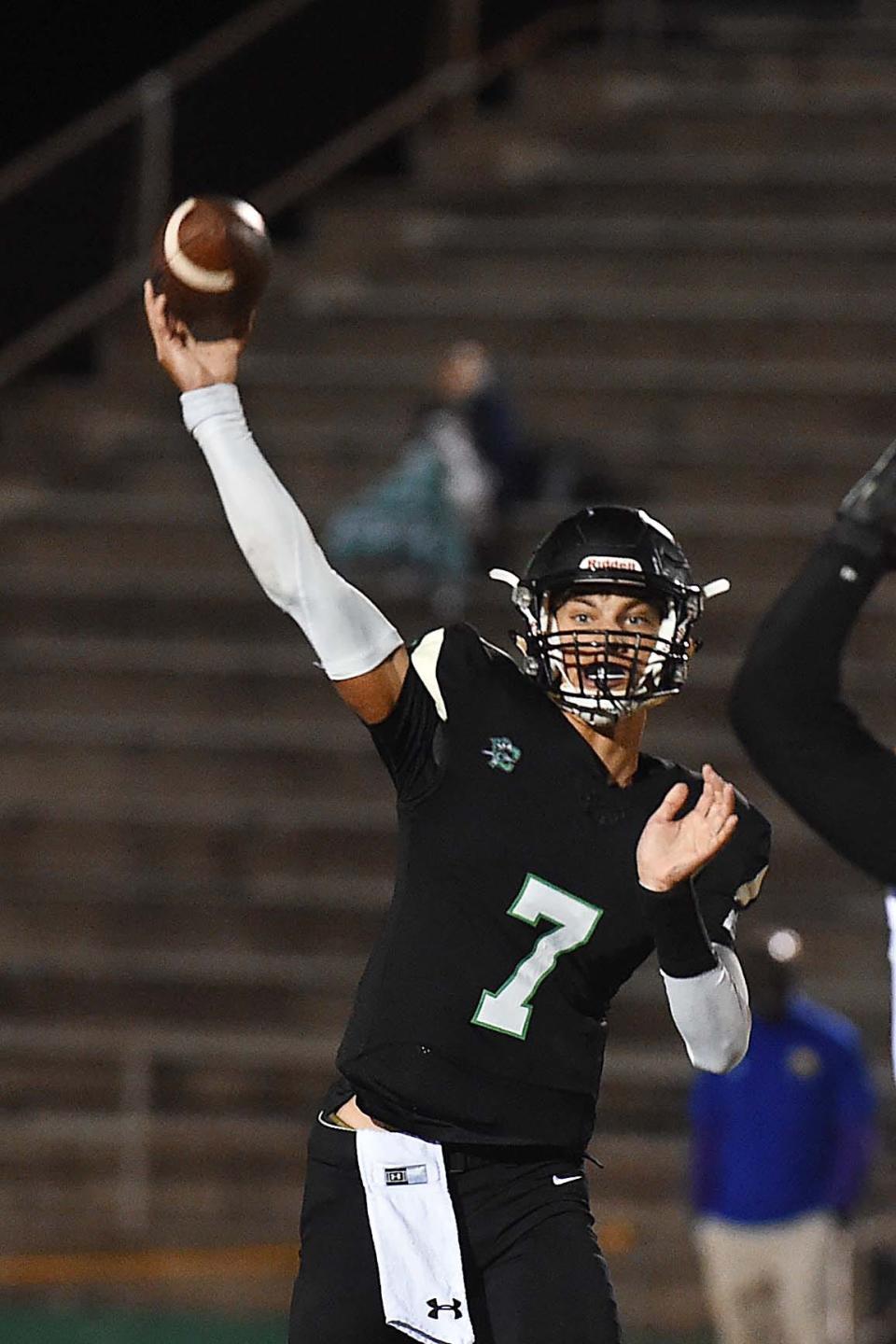 Choctawhatchee High School quarterback Jesse Winslette throws a pass early in the Indian's  home game against Richards High School. Rickards won the district game 34-28.