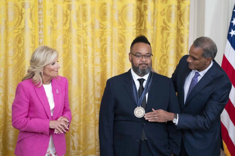First Lady Jill Biden looks on as Deputy Secretary of the U.S. State Department Richard Verma awards Robert Pruitt a medal Wednesday during the 2023 International Medal of Arts Ceremony in the East Room of the White House in Washington, D.C. Photo by Bonnie Cash/UPI