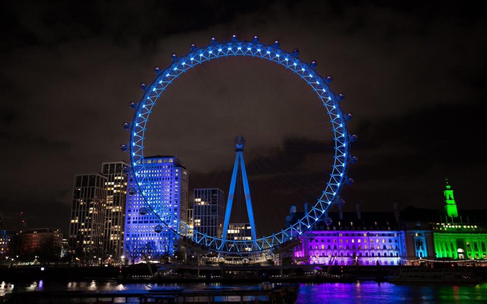 Handout photo issued by NHS England of the London Eye lit up in blue on Saturday evening to thank NHS staff for their role in fighting the coronavirus pandemic on the health service's 73rd birthday.  - PA