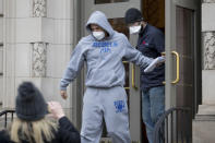 FILE - Derrick Evans exits the Sidney L. Christie U.S. Courthouse and Federal Building after being arraigned, Jan. 8, 2021, in Huntington, W.Va. Evans served three months in federal prison for his participation in the Jan. 6, 2021, riot at the U.S. Capitol. Evans is running for a U.S. House seat on Tuesday, May 14, 2024, in the West Virginia Republican primary against incumbent Rep. Carol Miller. (Sholten Singer/The Herald-Dispatch via AP, File)