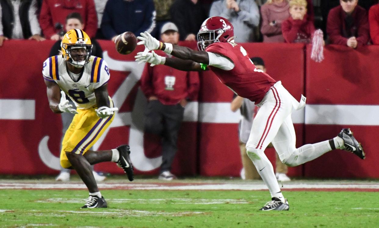 Alabama defensive back Terrion Arnold breaks up a pass intended for LSU receiver Malik Nabers at Bryant-Denny Stadium in Tuscaloosa, Alabama, Nov. 4, 2023.