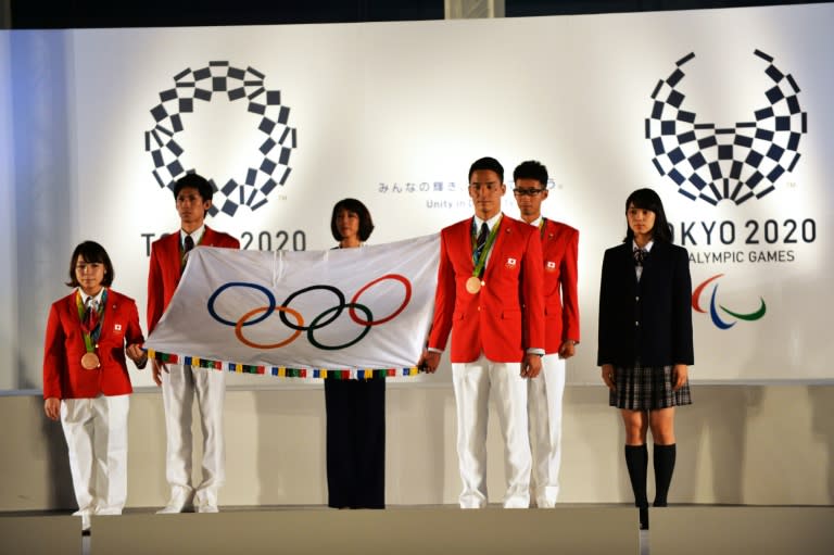 Japanese medallists of the Rio 2016 Olympic Games attend a flag-raising ceremony at the Tokyo Metropolitan Government Plaza on September 21, 2016