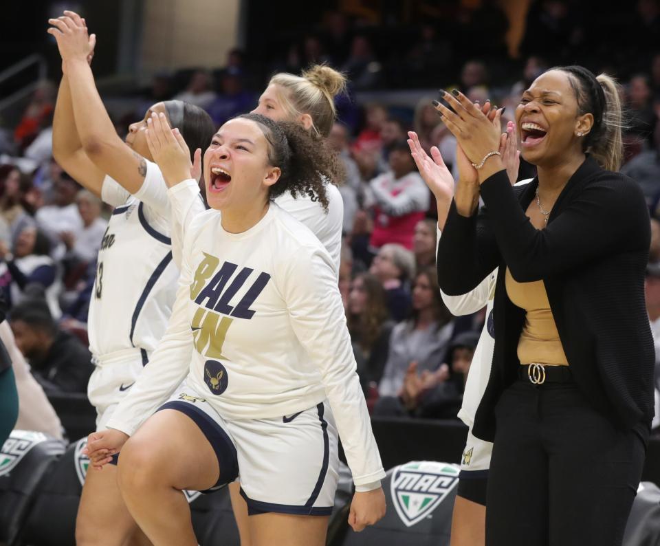 The Akron bench celebrates a 4th quarter basket during their 81-67 win over Bowling Green in a Mid American Conference Tournament quarterfinal game on Wednesday March 9, 2022 in Cleveland, Ohio, at Rocket Mortgage FieldHouse.