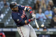 Minnesota Twins' Nelson Cruz hits a three-run home run off Seattle Mariners starting pitcher Justus Sheffieldvduring the fifth inning of a baseball game Wednesday, June 16, 2021, in Seattle. (AP Photo/Stephen Brashear)