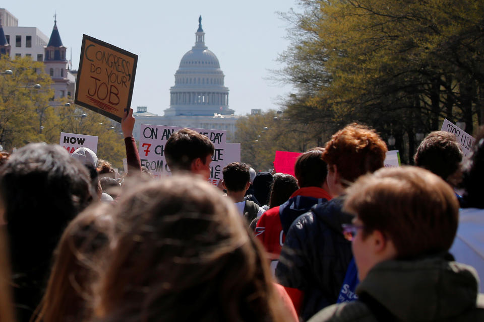 <p>Students march to the U.S. Capitol, as part of a nationwide walk-out of classes to mark the 19th anniversary of the Columbine High School mass shooting, in Washington, D.C., April 20, 2018. (Photo: Brian Snyder/Reuters) </p>