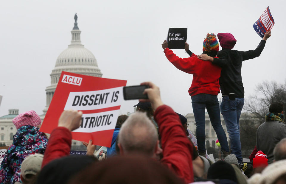 <p>Protesters attend the Women’s March on Washington, with the U.S. Capitol seen in the background, on January 21, 2017 in Washington, DC. (Mario Tama/Getty Images) </p>