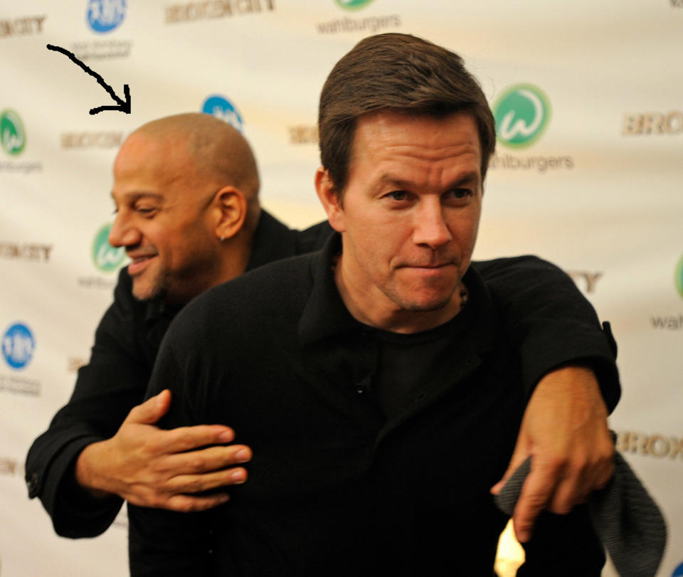 Allen Hughes hugs Mark Wahlberg