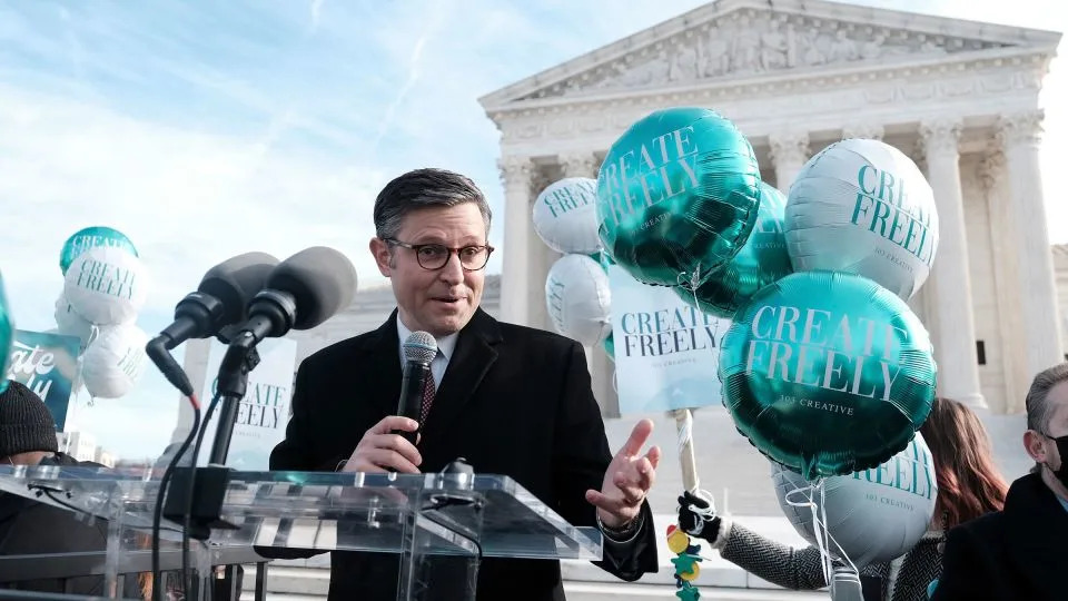 Rep. Mike Johnson speaking outside the U.S. Supreme Court building in Washington during arguments over whether businesses may decline services for same-sex weddings in December 2022. - Michael A. McCoy/The New York Times/Redux