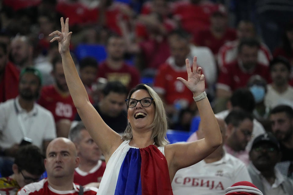 A Serbian supporter gestures during the World Cup group G soccer match between Serbia and Switzerland, at the Stadium 974 in Doha, Qatar, Friday, Dec. 2, 2022. (AP Photo/Ebrahim Noroozi)