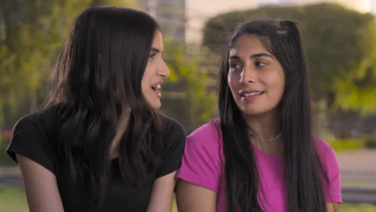  Kishori and Karishma talk to the camera on The Amazing Race. 