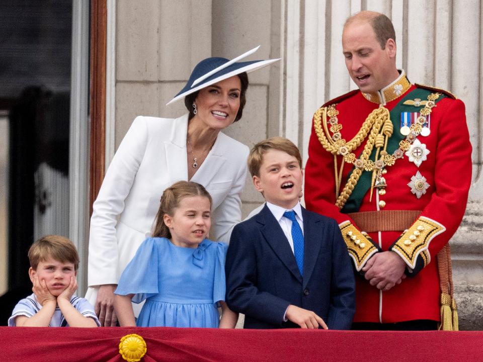 LONDON, ENGLAND - JUNE 02: Prince William, Duke of Cambridge and Catherine, Duchess of Cambridge with Prince Louis of Cambridge, Princess Charlotte of Cambridge and Prince George of Cambridge during Trooping the Colour on June 2, 2022 in London, England. Trooping The Colour, also known as The Queen's Birthday Parade, is a military ceremony performed by regiments of the British Army that has taken place since the mid-17th century. It marks the official birthday of the British Sovereign. This year, from June 2 to June 5, 2022, there is the added celebration of the Platinum Jubilee of Elizabeth II in the UK and Commonwealth to mark the 70th anniversary of her accession to the throne on 6 February 1952. 