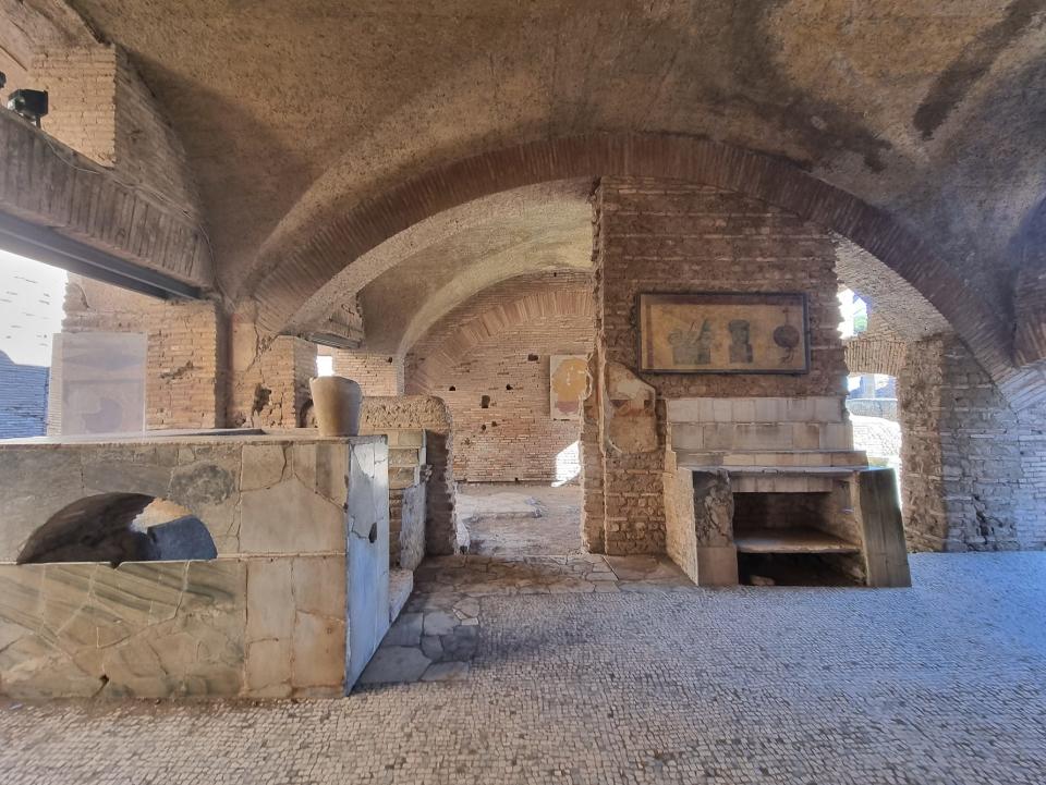 ruins of an ancient restaurant in ostia antica site in italy