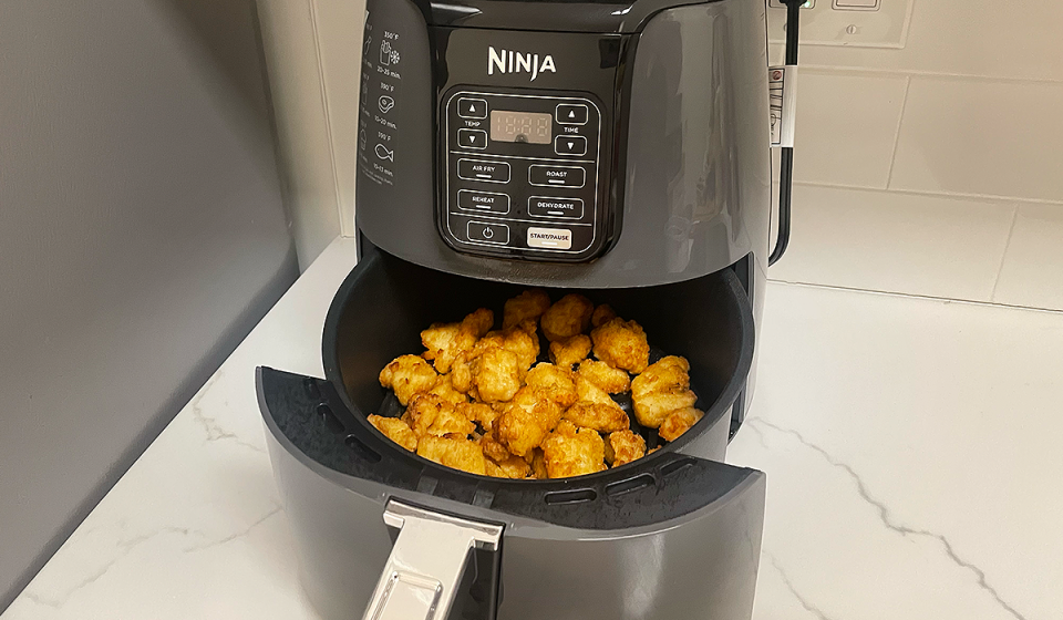 The Ninja 4-Quart Air Fryer is shown testing chicken tenders in Yahoo Life's Best Air Fryer guide.