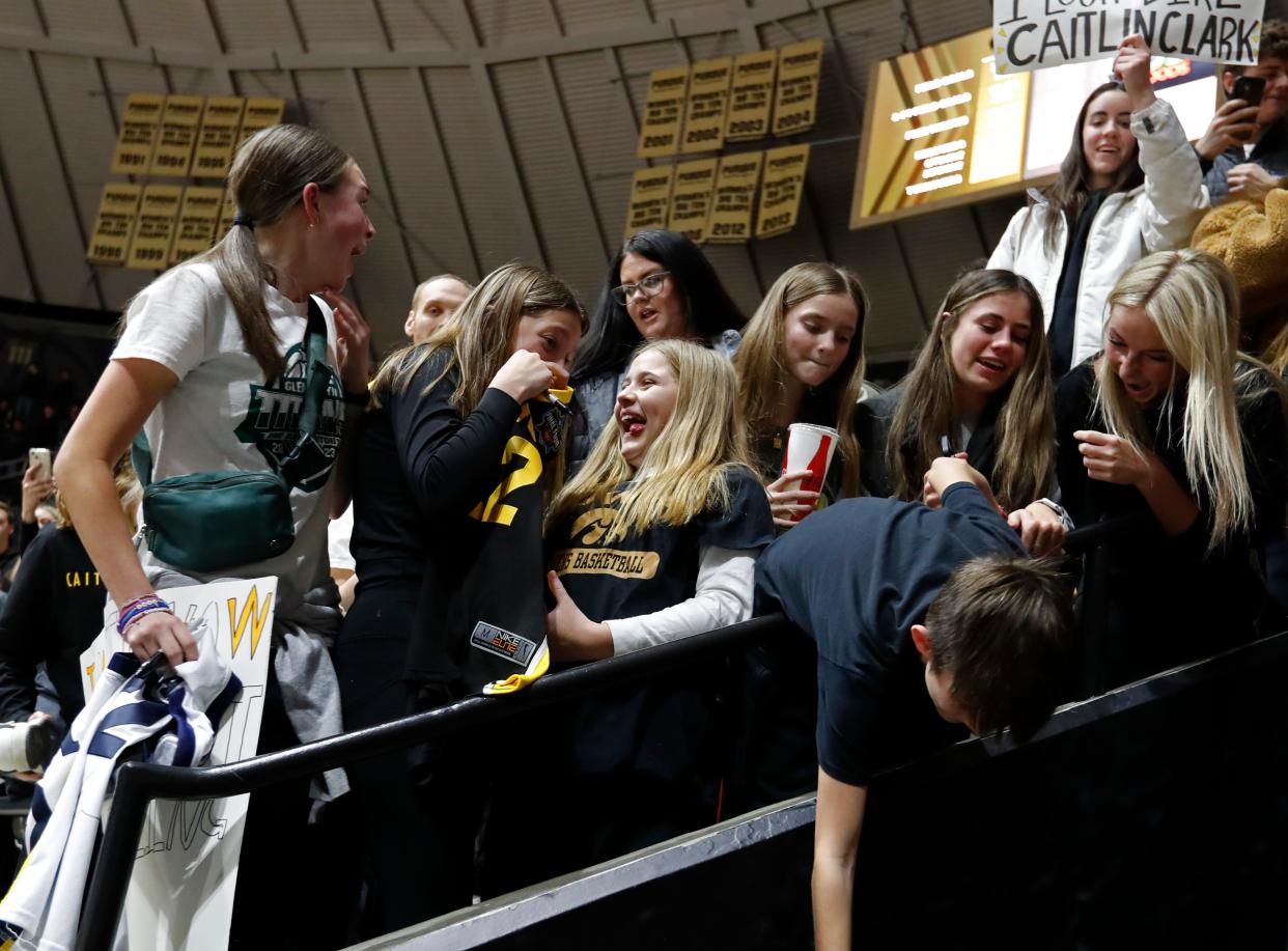 Iowa Hawkeyes guard Caitlin Clark (22) signs autographs after the NCAA women’s basketball game against the Purdue Boilermakers, Wednesday, Jan. 10, 2024, at Mackey Arena in West Lafayette, Ind. Iowa Hawkeyes won 96-71.