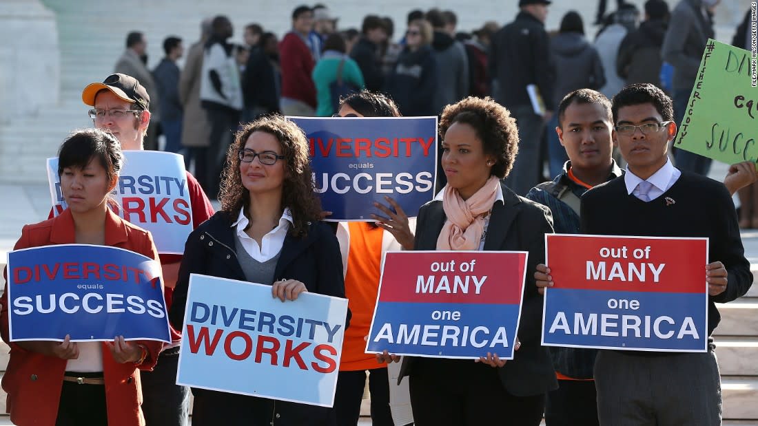 <p>Protesters hold signs in front of the US Supreme Court on October 10, 2012, in Washington. The high court is scheduled to hear arguments on Fisher V. University of Texas at Austin and are tasked with ruling on whether the university's consideration of race in admissions is constitutional. (Photo by Mark Wilson/Getty Images)</p><div class="cnn--image__credit"><em><small>Credit: File/Mark Wilson/Getty Images / Getty</small></em></div>