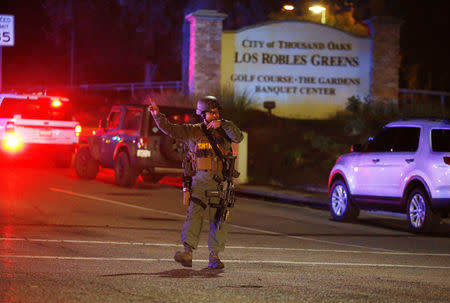 Police guard the site of a mass shooting at a bar in Thousand Oaks, California, U.S. November 8, 2018. REUTERS/Ringo Chiu